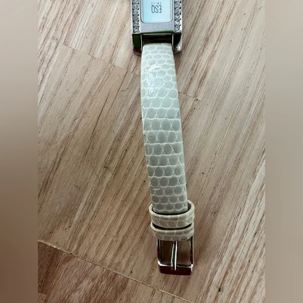 ESQ by Movado ladies skinny silver tone rectangular dress watch NEW BATTERY